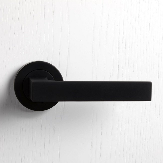 Precision-machined architectural handle